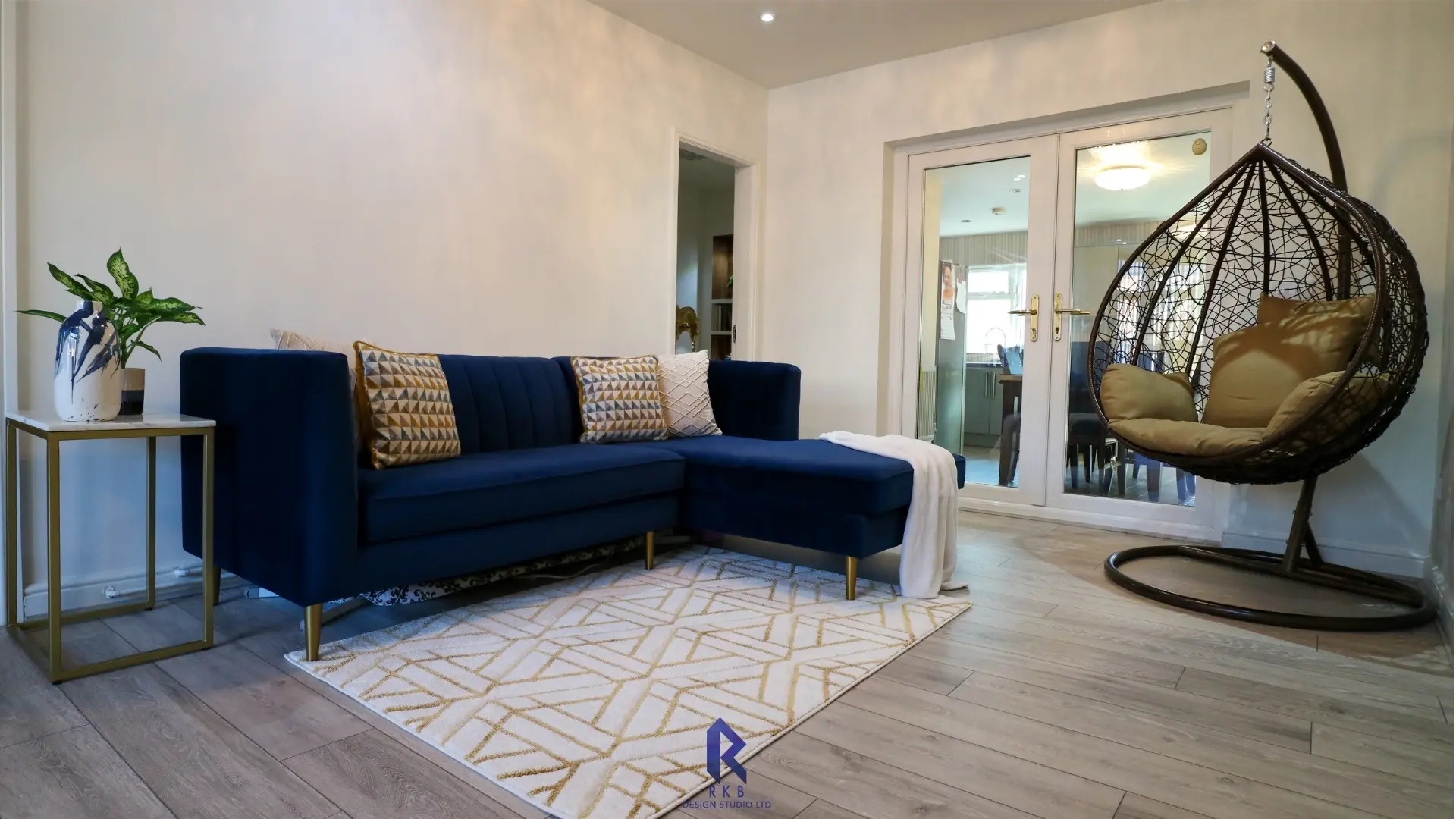 living room design with navy sofa